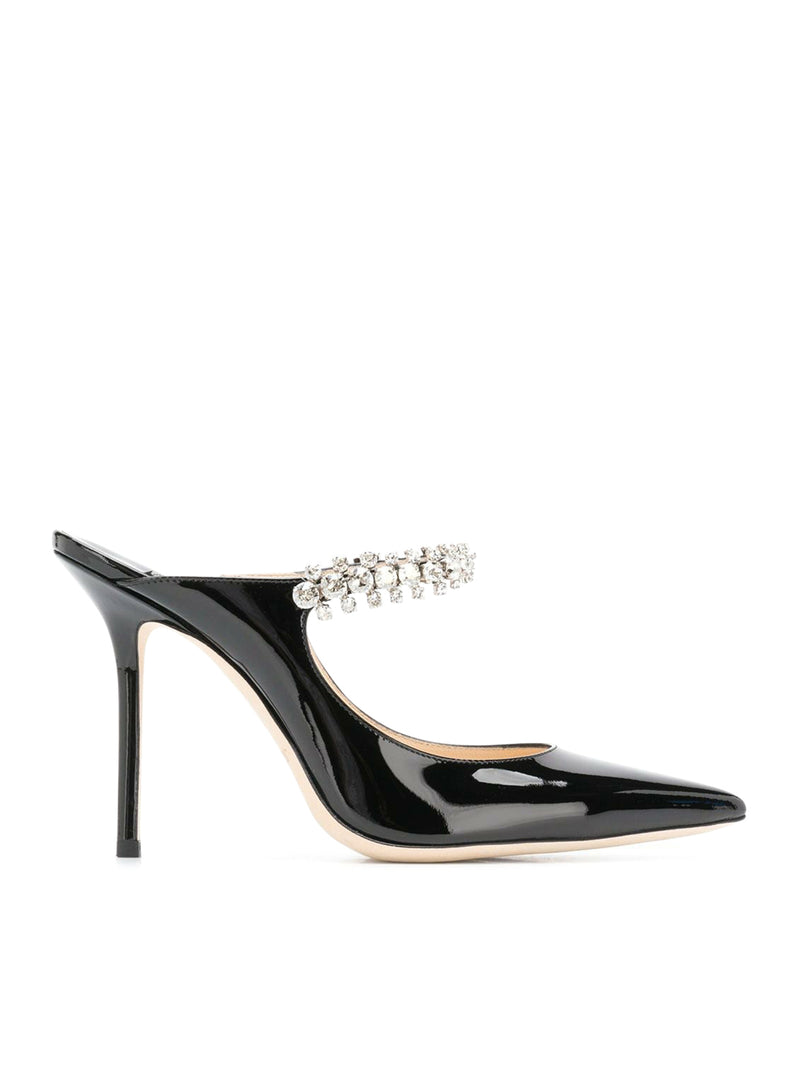 Suitnegozi Mules in vernice con cinturino in cristallo